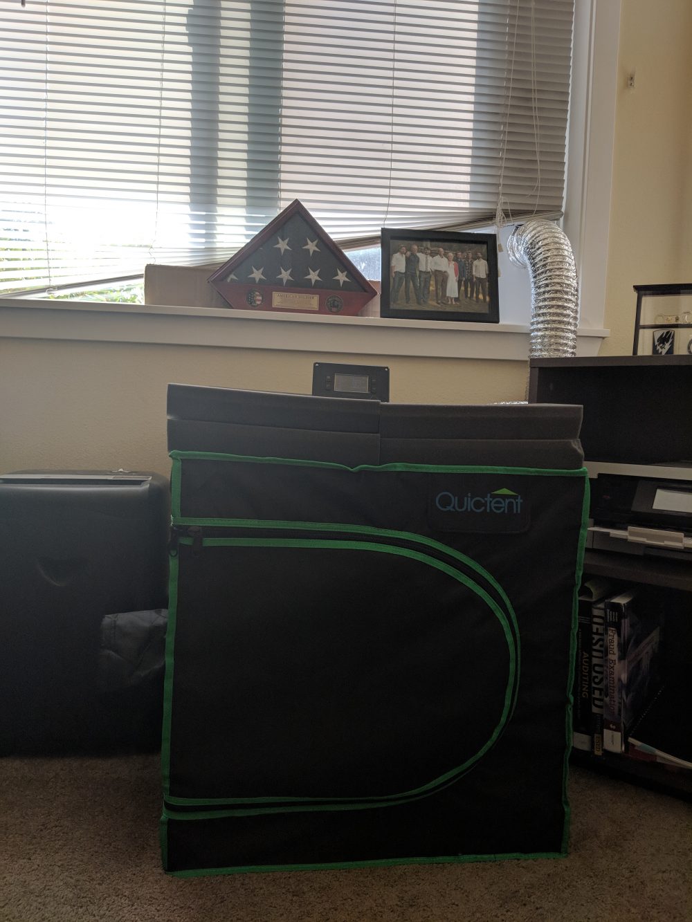 A large black cloth box in the middle of room
